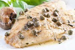 Halibut with Lemon-Garlic Sauce was pinched from <a href="http://12tomatoes.com/2014/11/fish-recipe-panseared-halibut.html" target="_blank">12tomatoes.com.</a>