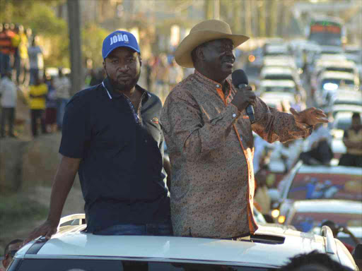 ODM deputy party leader Hassan Joho with Cord leader Raila Odinga at Mama Ngina Grounds in Mombasa last Wednesday / JOHN CHESOLI