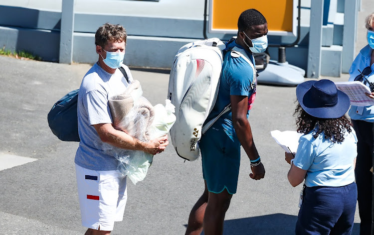 Frances Tiafoe, right, and coach Wayne Ferreira at Melbourne Park ahead of the 2021 Australian Open. Picture: ASANKA RATNYAKE/GETTY IMAGES