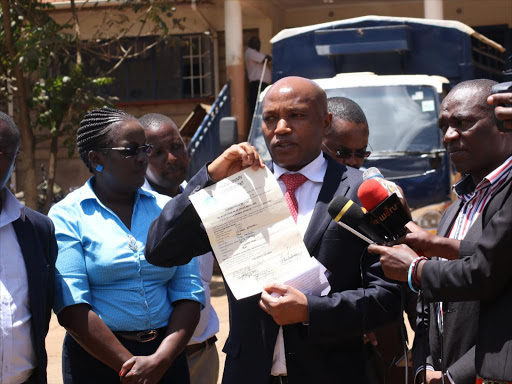 Deputy governor Titus Ntuchiu with county officials at Meru police station February 13, 2018. /GERALD MUTETHIA