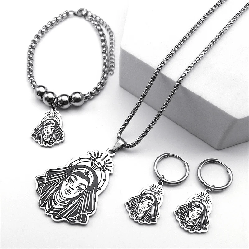 Collier femme et boucles d'oreilles unisexe en acier titane. Ensemble de bijoux élégant pour femmes et hommes. Ornements polyvalents.