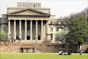 inadequate:  Students sit on the lawn at Wits University in Johannesburg. Staff at universities say they lack aids to help develop teaching materials in African languages says Professor Pitika Ntuli Photo: KEARA EDWARDS