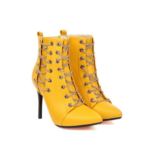 Title 2, Pointed stiletto boots for a bold statement. El...