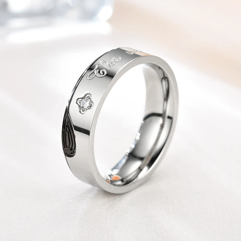Title 3, Anillos de pareja de acero inoxidable con micro...