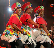 Mahotella Queens, Nobesuthu Mbadu, Hilda Tloubatla and Amanda Nkosi, perform on stage in this file picture.