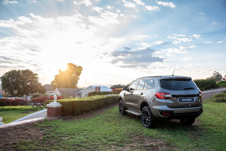 Black trim for the front and rear bumpers, as well as 20-inch alloys (in black too) pretty much comprise the full extent of the Sport makeover.