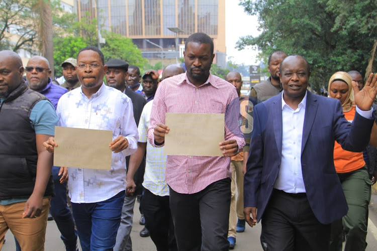 Azimio MPs walking from Parliament buildings towards the Office of the President along Harambee Avenue on Mary 2, 2023