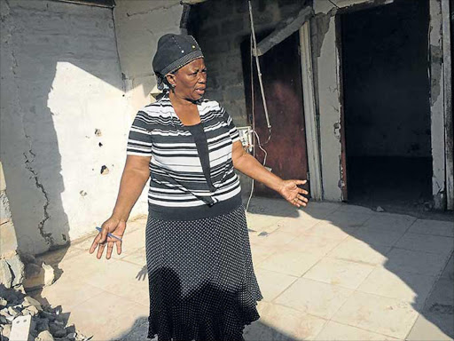 FALLING APART: Norati Dyani does not believe her home, damaged by a truck will be fixed soon, as promised Picture: ZWANGA MUKHUTHU