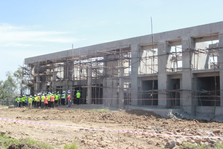 Government and World Bank officials tour the Sh 394 million Regional Flagship TVET Institute for Textile Technology at Kisumu National Polytechnic on Wednesday.