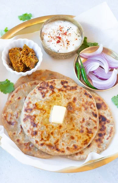 Desi Breakfast ( Two Parathas/ Curd/tea/coffee )