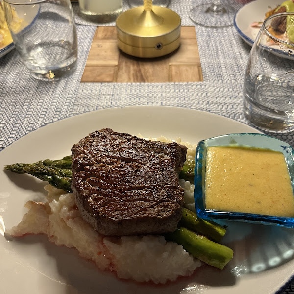 Petit filet with lobster risotto, asparagus, & hollandaise sauce