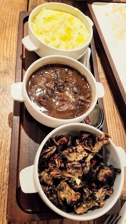 Seasonal Fish fileted tableside with truffle potato purée, wild mushrooms, chasseur sauce at King Tide Fish and Shell, Portland.