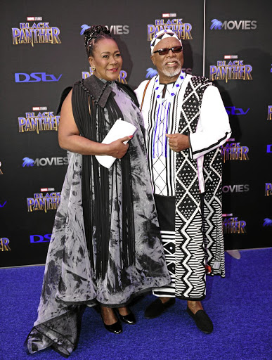 Connie Chiume and John Kani strike a magnificent pose during the 'Black Panther' premiere at Montecasino last year. /Tebogo Letsie/Gallo