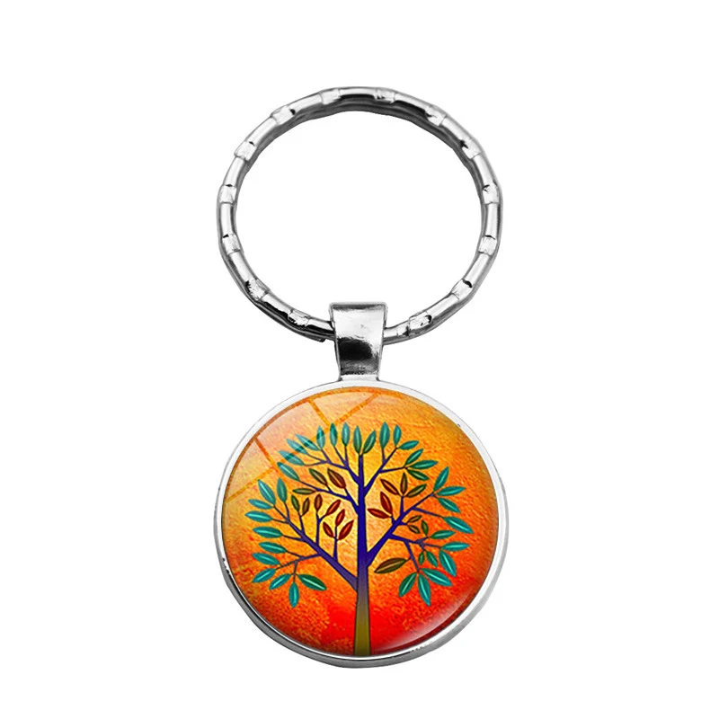 Ženski privezak za ključeve Tree Of Life Time Stone, elegantan i simboličan. Nosite pozitivnu energiju i zaštitu, idealan poklon za nju.