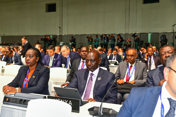 President William Ruto and CS Environment Soipan Tuya during the UN Climate Change Conference in Dubai on December 1,2023.