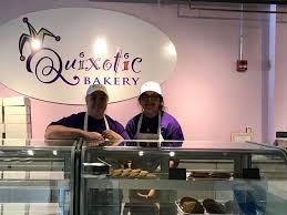 The owner and an employee behind the counter!