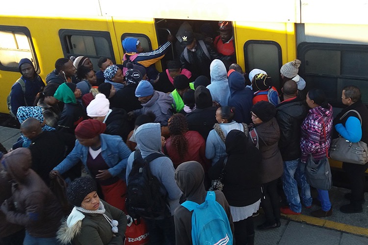 Commuters at Parow train station.Trains were two hours late on Tuesday morning