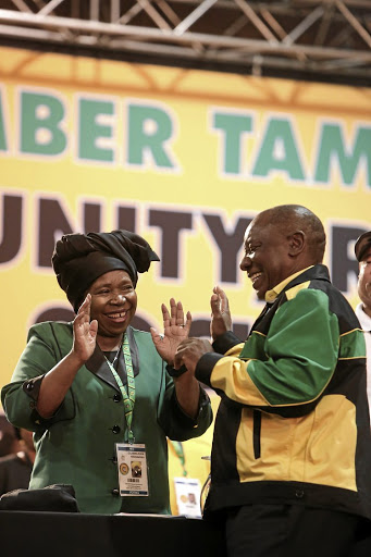 Nkosazana Dlamini-Zuma and Cyril Ramaphosa share a moment at the ANC's elective conference.