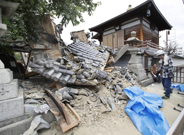 Damaged Myotoku-ji temple caused by an earthquake is seen in Ibaraki, Osaka prefecture, western Japan, in this photo taken by Kyodo June 18, 2018.
