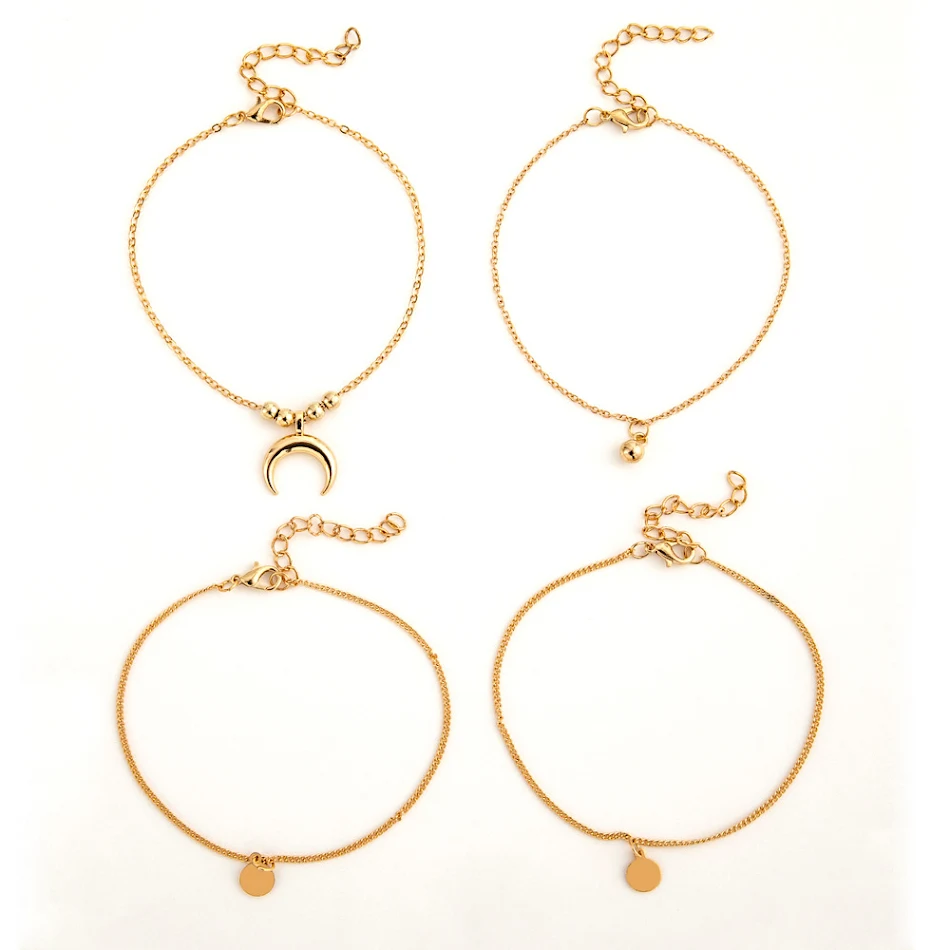 Ornements de pied simples et de qualité avec clochettes et disques de lune, parfaits pour un style bohème chic et un look enchanteur.