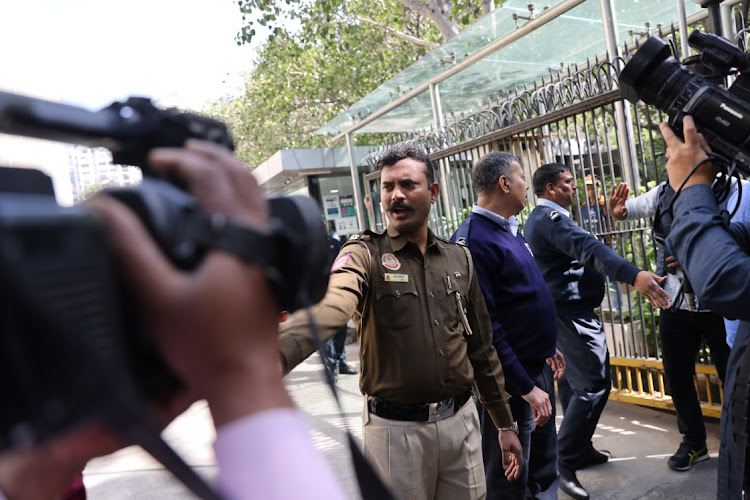 Police officers stand outside the BBC's offices in a raid in February in New Delhi, India. Picture: ANUSHREE FADNAVIS/REUTERS