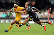 Jeremy Ward (R) of the Cell C Sharks tackling Matias Orlando of the Jaguares during the Super Rugby match at Growthpoint Kings Park on April 08, 2017 in Durban, South Africa.