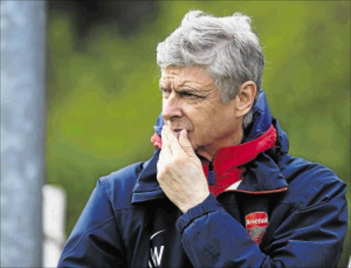 GUNNED DOWN : Arsenal manager Arsene Wenger