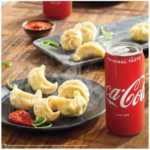 2 Veg Momo + 2 Cold Drink250 Ml