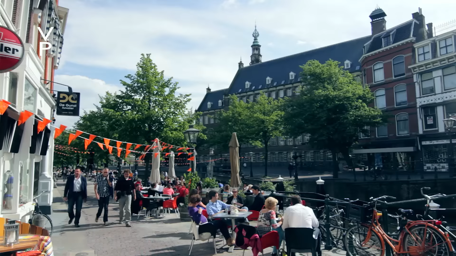 street with tables and people on it