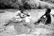 HEALTH RISK: Women risk cholera when they collect water from the Ngolombi River at Mavambe village 01/03/09. Pic. Chester Makana. © Sowetan.