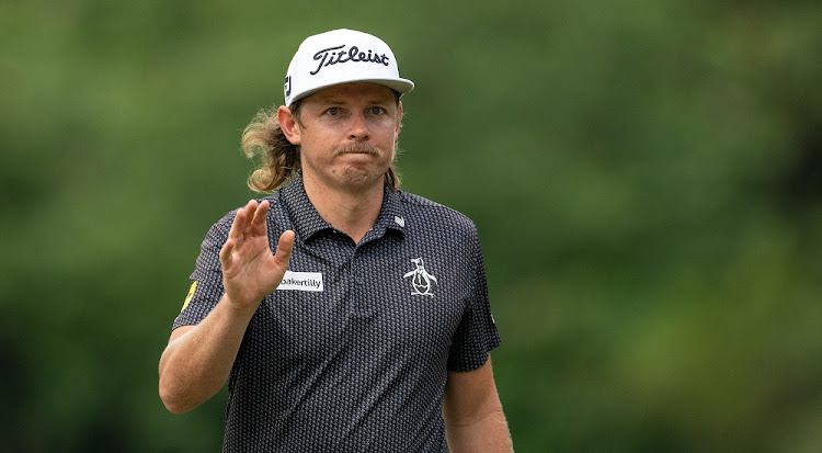 Cameron Smith acknowledges the crowd after holing his putt on hole 16 during the first round of the Hong Kong Open at Hong Kong Golf Club on November 9 2023 in Hong Kong, China. Picture: JASON BUTLER/GETTY IMAGES