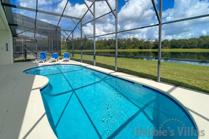 Gorgeous lake view from the pool deck at this Kissimmee vacation villa