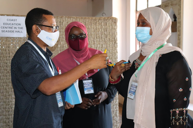 Human rights defender and lawyer Yusuf Abubakar, Coec executive director Halima Mohamed ad Mombasa woman rep Ashu Hussein at Reef Hotel on Monday.