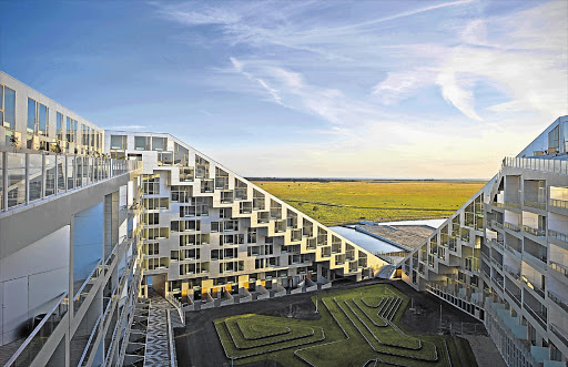 FUTURISTIC: Above, VM Houses in Ørestad, Denmark. Below left, 8Tallet, also designed by Bjarke Ingels