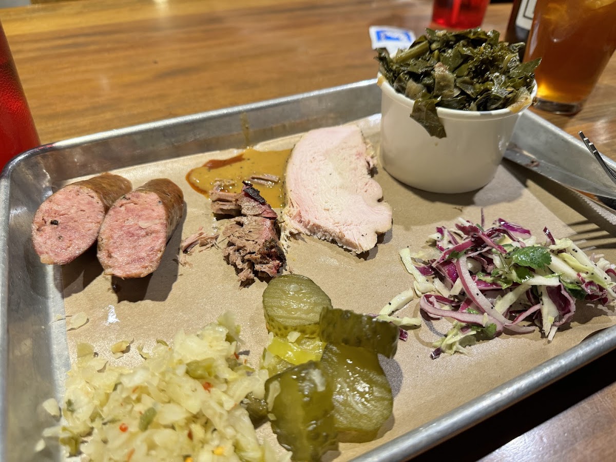 Mix of turkey, classic Kielbasa and brisket. With collards and coleslaw.