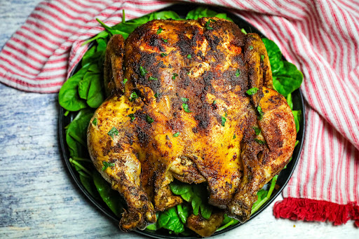 Healthy Rotisserie Chicken on a plate to serve.