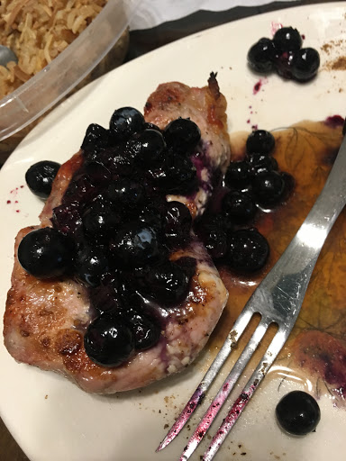 Blueberry-ginger relish covered pork chop