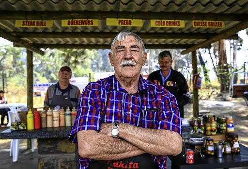 From left: Brian Viljoen, Johan Grobbelaar and Hendrik Botha selling boerewors rolls and prergo rolls next to the Rand Airport.