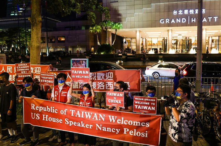 Protesters gather outside the Grand Hyatt hotel in support of the visit of US House Speaker Nancy Pelosi, in Taipei, Taiwan, on August 2 2022.