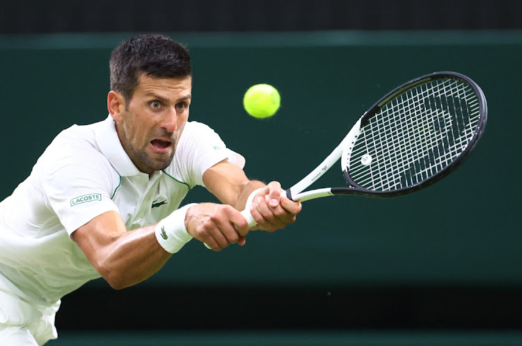 Serbia's Novak Djokovic in action during his fourth round match against Netherlands' Tim van Rijthoven at the Wimbledon Championships in London on July 3, 2022