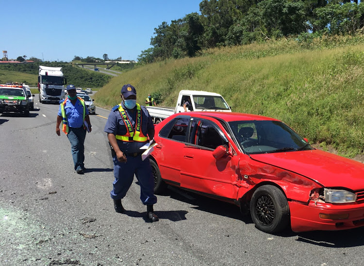 Police on the scene after an accident on the N2 in East London left one driver. The driver of the red car allegedly fled the scene.