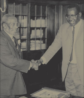 Mzee Jomo Kenyatta in 1964 congratulating then Nandi Laibon mzee Barsirian arap Manyei after presenting him with a Talai traditional cloak (Sambut) at State House Nakuru