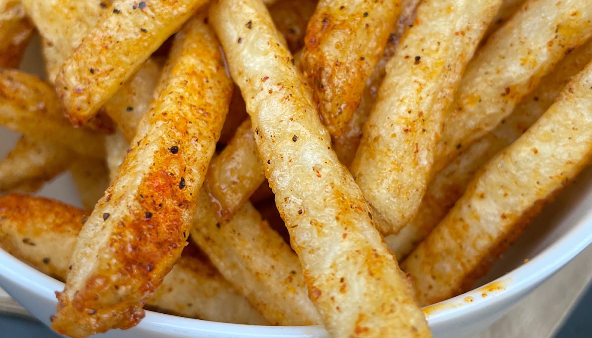 Honey Cajun Fries - Hand-cut kennebec fries coated with cajun spice and drizzled with honey. 

Agave syrup is used for our vegan friends.