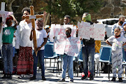 People from different organisations hold a prayer service at the Castle Of Good Hope in Cape Town to bring attention to the scourge of violence against women and children and to remember those who lost their lives in their communities. File photo. 