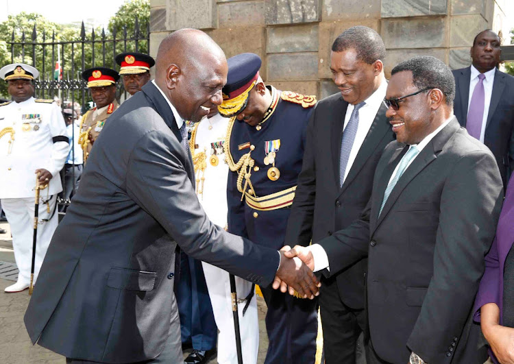 Deputy President William Ruto greets Senate Speaker Kenneth Lusaka ahead of the viewing of former President Daniel Moi at Parliament on Saturday, February 8, 2020.