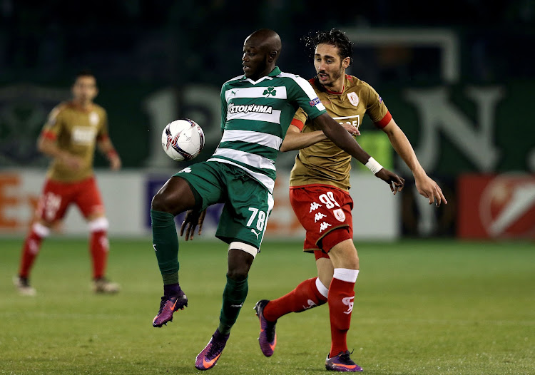 Ousmane Coulibaly of Panathinaikos against Ishak Belfodil of Standard Liege.