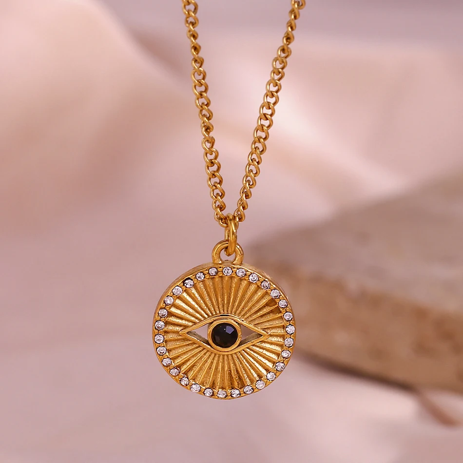 Collier minimaliste en acier inoxydable noir avec motif yeux. Bijou élégant et intemporel pour hommes et femmes. Accessoire parfait.
