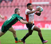 Wandisile Simelane of the Lions challenged by Jack Carty of Connacht during their United Rugby Championship match at the Ellis Park Stadium.