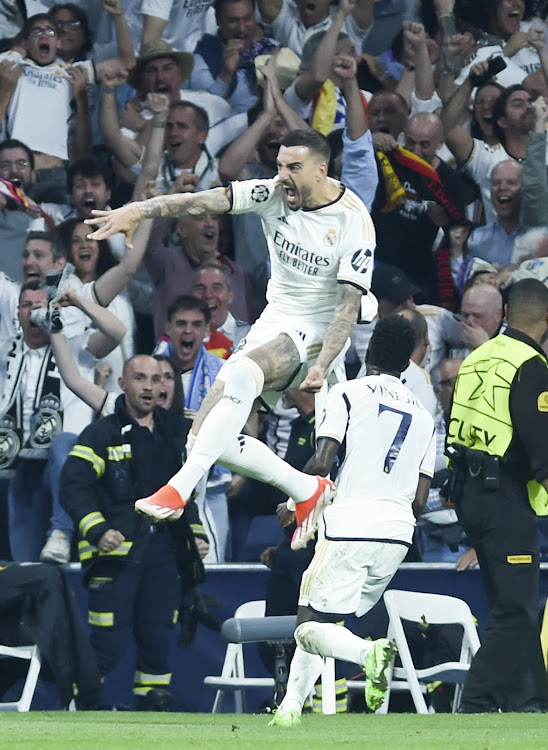 Real Madrid's Joselu and Vinicius Jnr celebrate