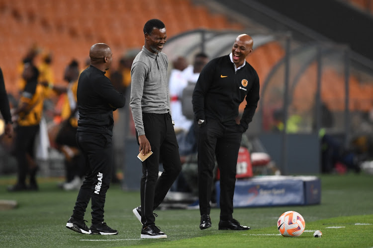 Kazier Chiefs team manager Gerald Sibeko, coach Arthur Zwane and sporting director Kaizer Motaung Jnr share a light moment during a match at FNB Stadium last October.
